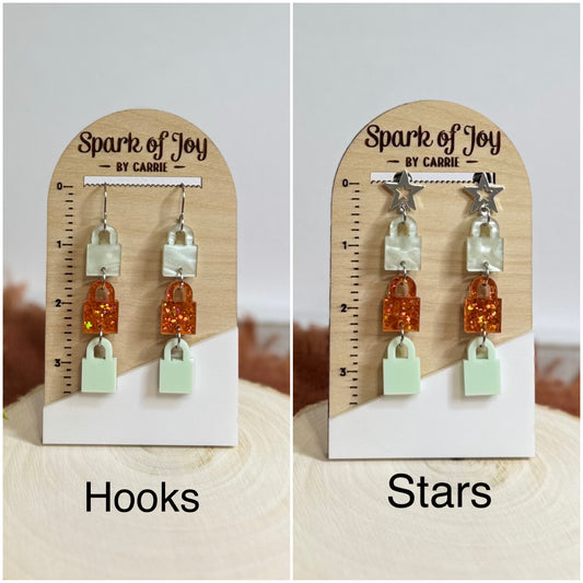 3 Lock Showgirl Themed Dangle Earrings