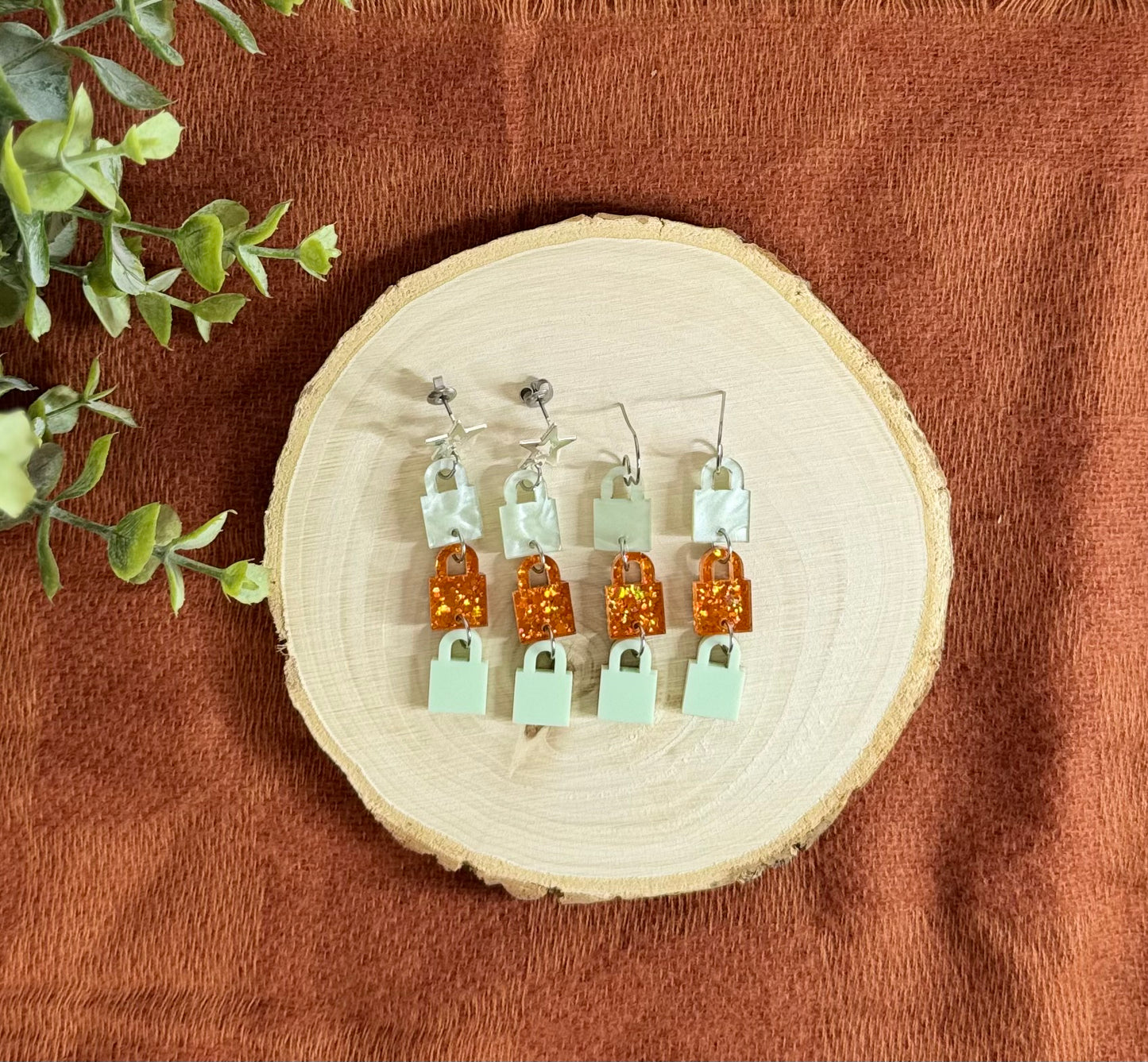 3 Lock Showgirl Themed Dangle Earrings